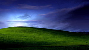 Windows XP Bliss Desktop Landscape with Rolling Green Hills and Dramatic Sky HD wallpaper