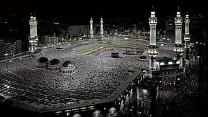 Aerial Night View of the Grand Mosque in Mecca with the Kaaba and Minarets HD wallpaper