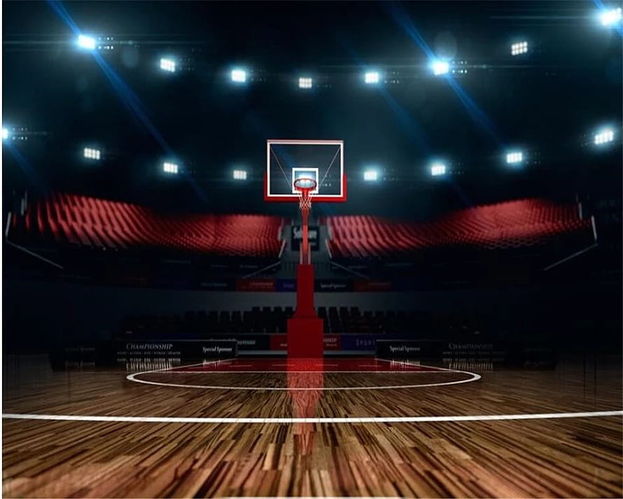 Empty Basketball Arena with Dramatic Overhead Lighting and Polished Wooden Court HD wallpaper
