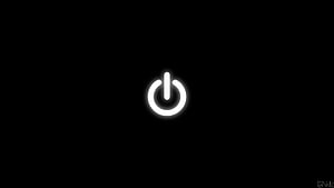 Minimalist Glowing Power Button Icon on Pure Black Background HD wallpaper