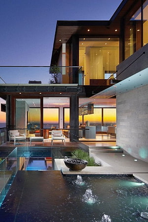 Modern Luxury Villa Exterior at Dusk with Infinity Pool and Ocean View HD phone wallpaper