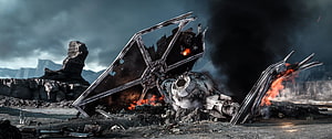 Crashed Star Destroyer Wreckage Burning on a Desolate Rocky Planet HD wallpaper