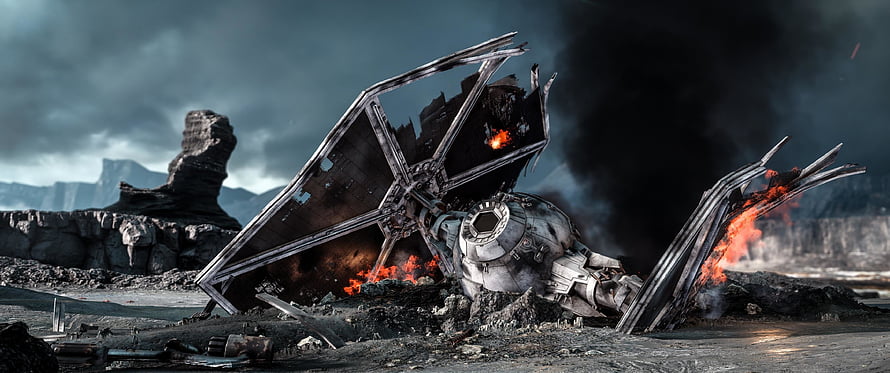 Crashed Star Destroyer Wreckage Burning on a Desolate Rocky Planet HD wallpaper