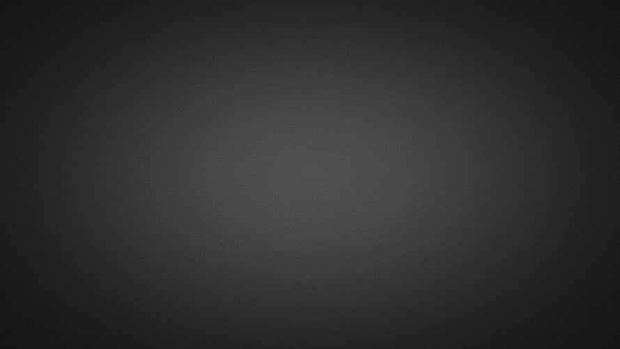 Minimalist Dark Gray Gradient Texture with Subtle Vignette and Soft Center Glow HD wallpaper