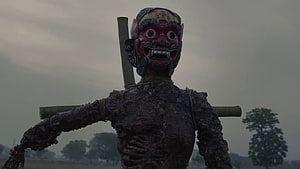 Asur Demon Mask Scarecrow in Misty Field HD wallpaper