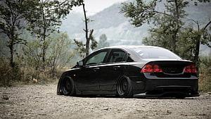 Stanced Black Honda Civic Si Sedan Parked on Gravel Road with Mountain Backdrop HD wallpaper
