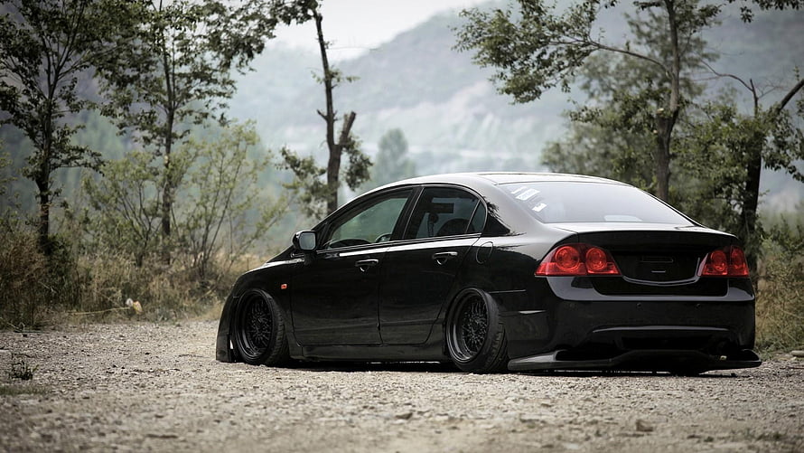 Stanced Black Honda Civic Si Sedan Parked on Gravel Road with Mountain Backdrop HD wallpaper