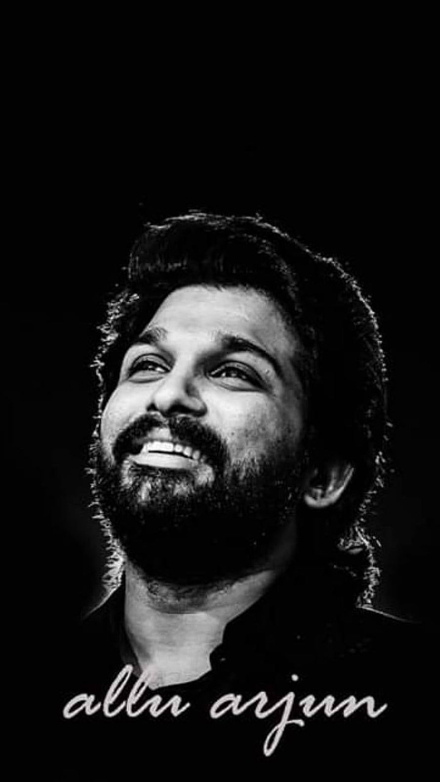 Allu Arjun Black and White Portrait with Bearded Smile and Dramatic Lighting HD phone wallpaper