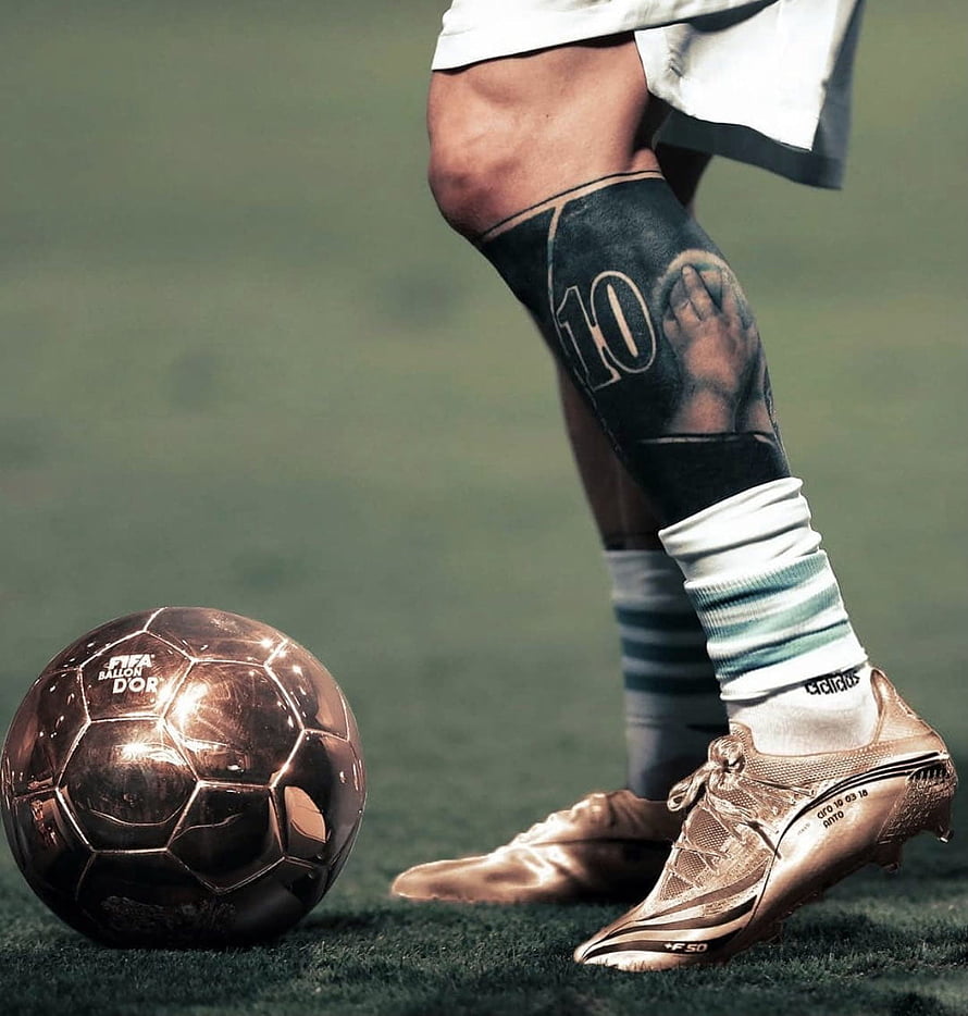 Leo Messi Gold Ballon d'Or Soccer Boots and Leg Tattoo Close-Up HD phone wallpaper