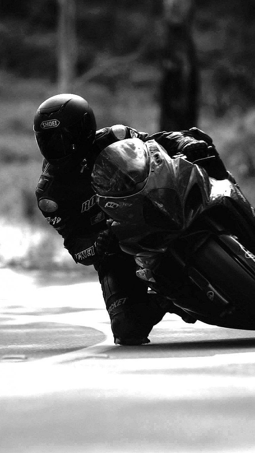 Black and White Motorcycle Racer Cornering on Track HD phone wallpaper