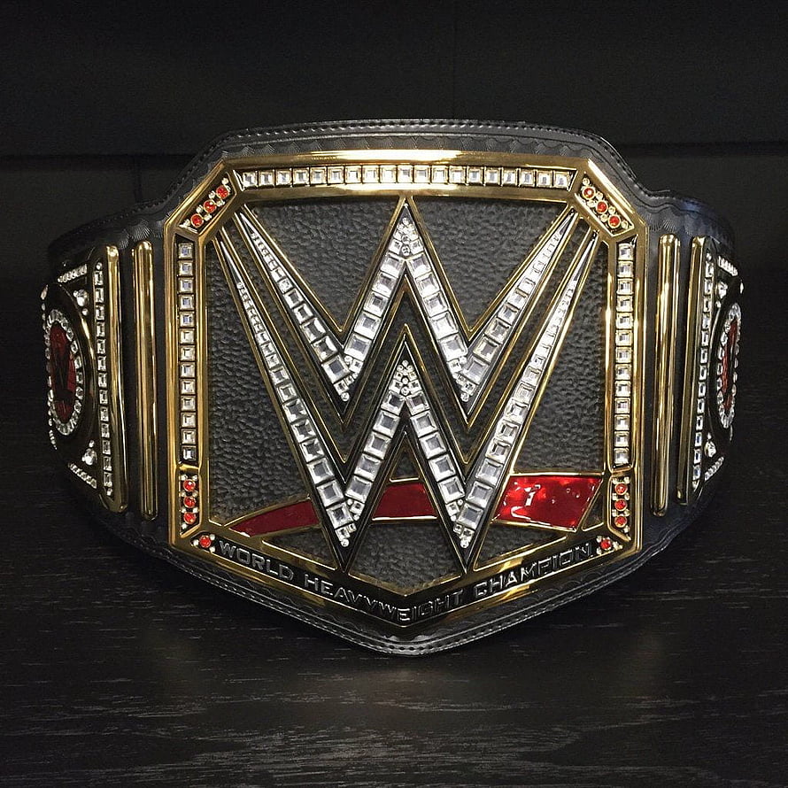 WWE World Heavyweight Championship Belt with Diamond Encrusted Logo and Gold Plating HD phone wallpaper