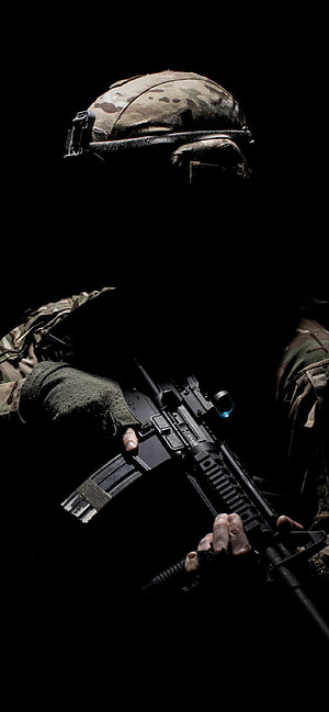 Tactical Soldier in Camouflage Holding Modern Assault Rifle in Dark Silhouette HD phone wallpaper