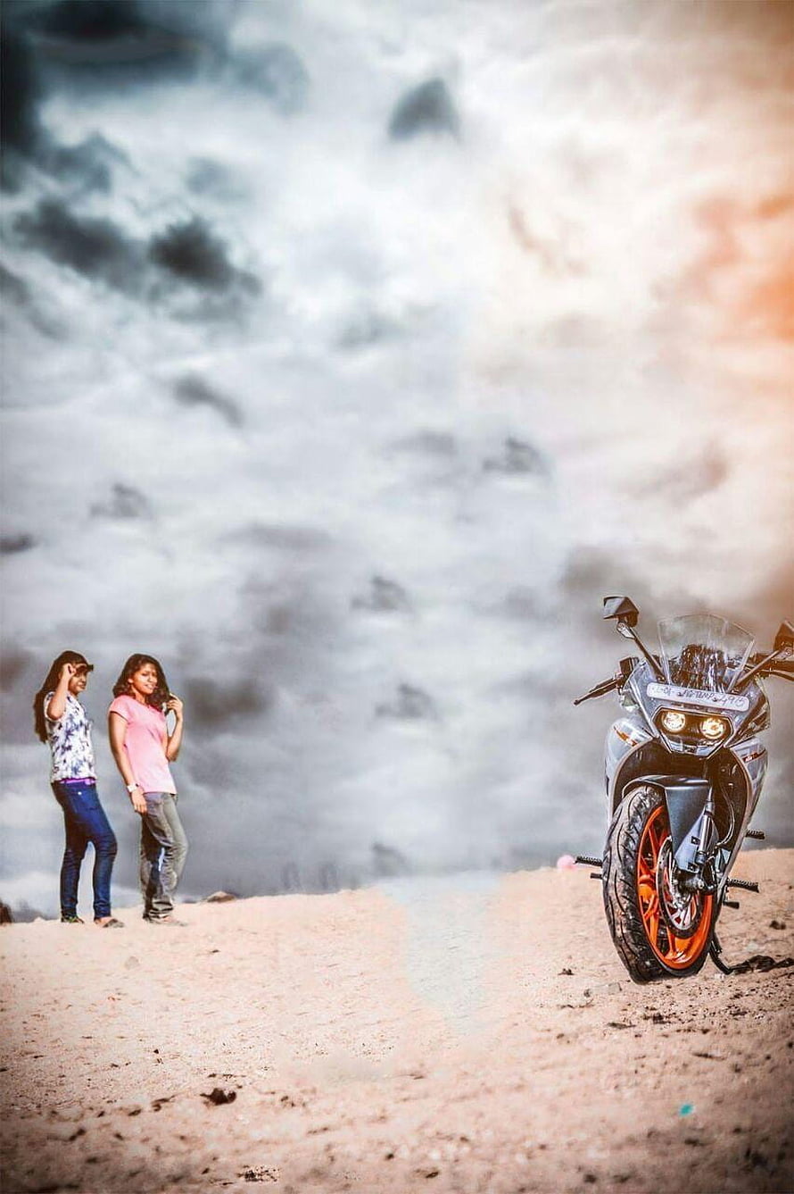 Two Women and a Sport Motorcycle on a Misty Mountain Ridge at Sunset HD phone wallpaper