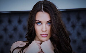 Lana Rhoades Portrait with Blue Eyes and Dark Hair Against Tufted Background HD wallpaper
