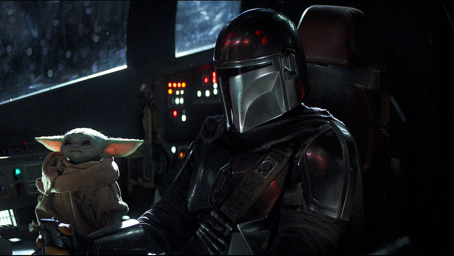 The Mandalorian and Grogu in the Razor Crest cockpit with glowing control panels HD wallpaper
