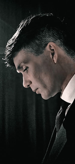 Thomas Shelby from Peaky Blinders in a moody black and white profile portrait HD phone wallpaper