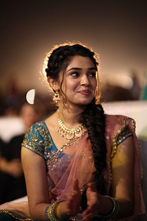Krithi Shetty in Traditional Indian Attire with Gold Jewelry and Braid HD phone wallpaper