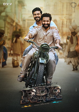 RRR Movie Poster Featuring Two Men Riding a Vintage Motorcycle Through a Historic Street HD phone wallpaper