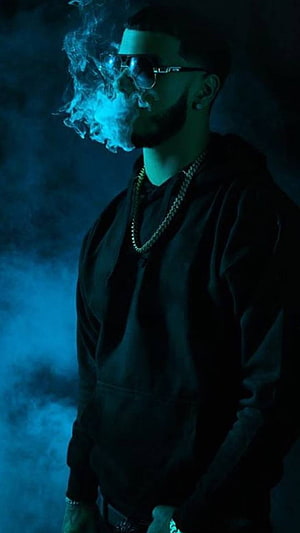 Anuel AA in Dark Blue Smoke with Sunglasses and Gold Chain HD phone wallpaper