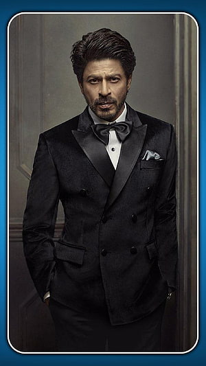 Shah Rukh Khan in a Formal Black Double-Breasted Tuxedo with Bow Tie HD phone wallpaper