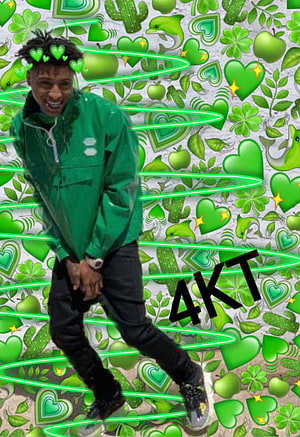 NBA Youngboy in Green Jacket Against Vibrant Green Heart and Clover Pattern Background HD phone wallpaper
