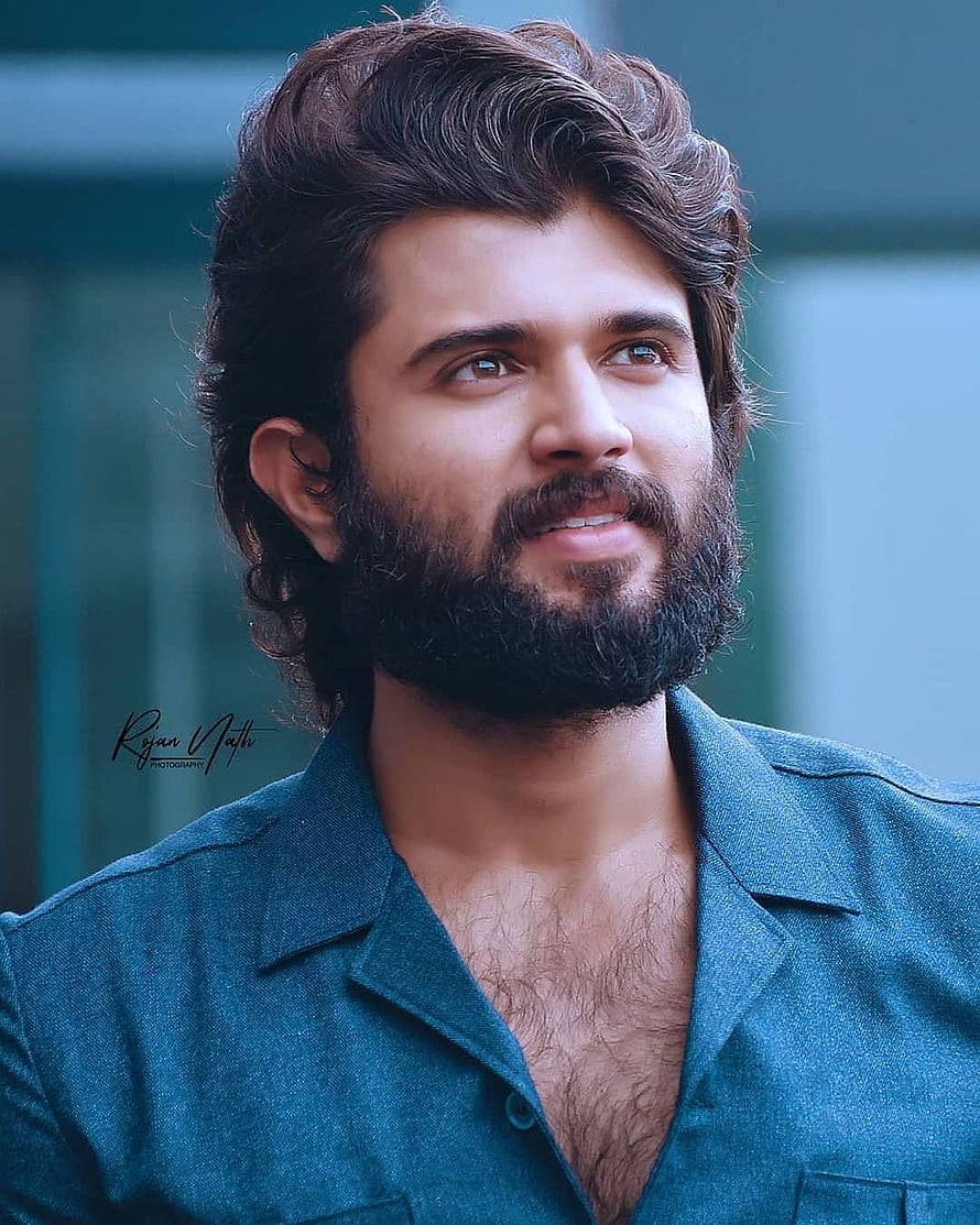 Vijay Deverakonda Portrait in Teal Shirt with Full Beard and Wavy Hair HD phone wallpaper