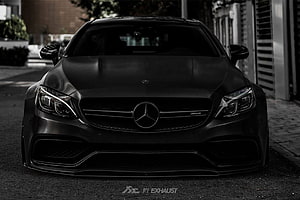 Matte Black Mercedes-AMG C63 Front Facade with Aggressive Grille and LED Headlights HD wallpaper