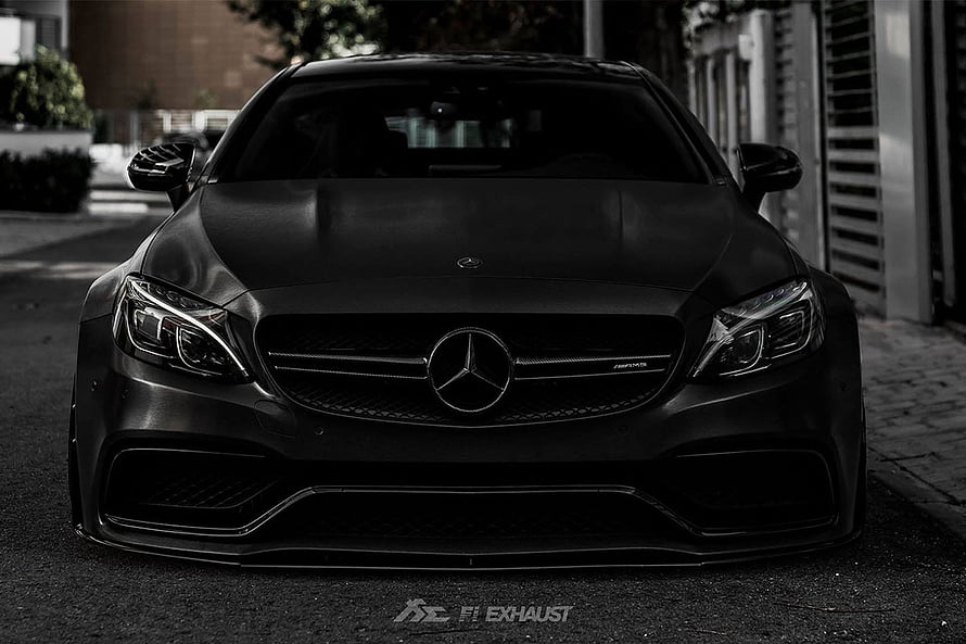 Matte Black Mercedes-AMG C63 Front Facade with Aggressive Grille and LED Headlights HD wallpaper