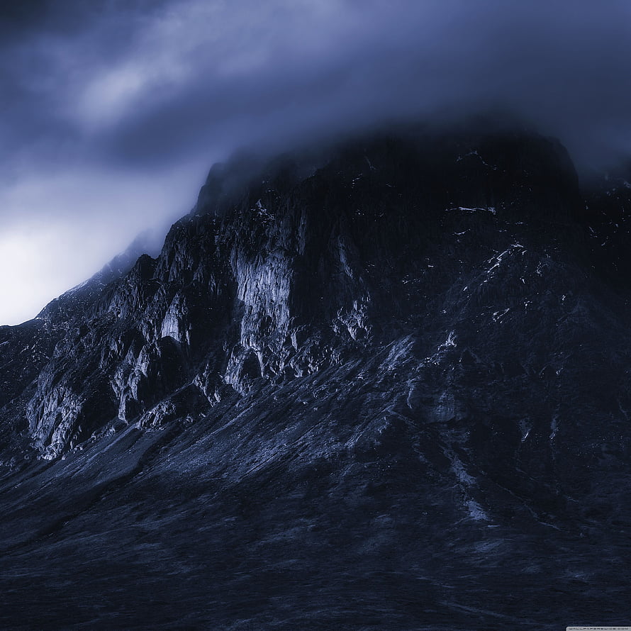 Moody Mountain Peak Shrouded in Dark Clouds and Mist HD phone wallpaper