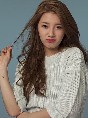 Bae Suzy Portrait in White Knit Sweater with Long Wavy Hair HD phone wallpaper