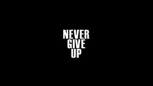 Minimalist Black Background with Bold White Never Give Up Typography HD wallpaper