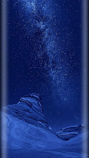 Milky Way Galaxy Rising Over Rugged Desert Rock Formation at Night HD phone wallpaper