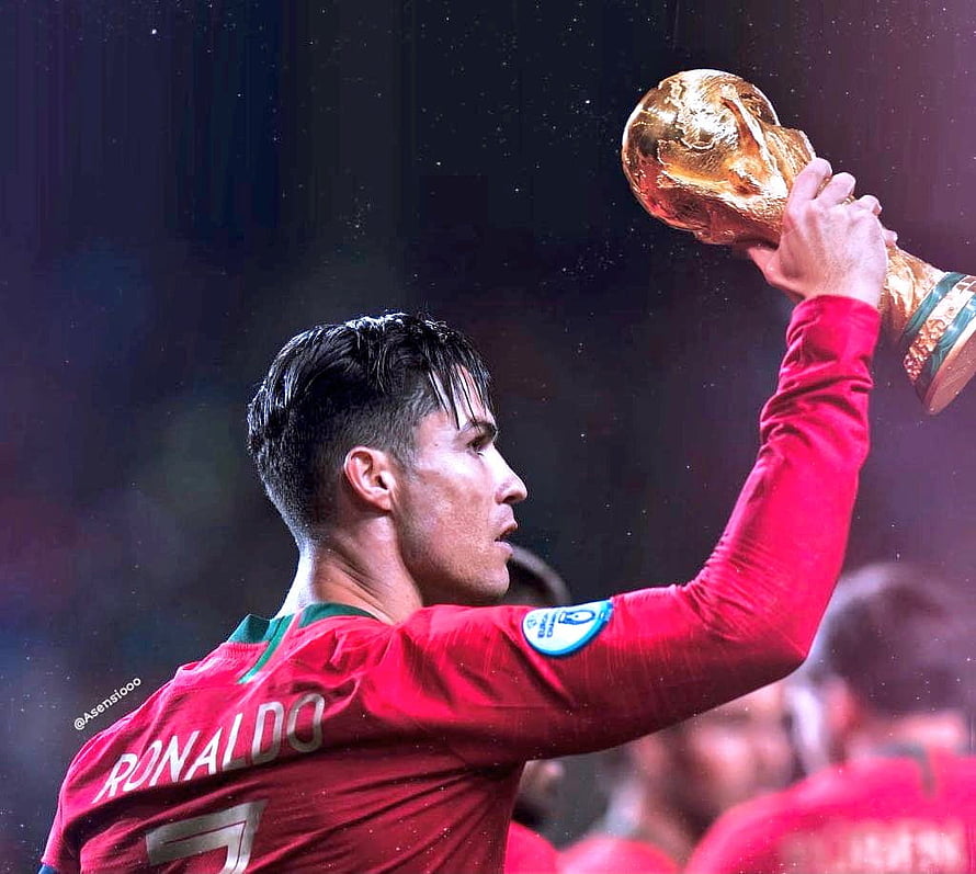 Cristiano Ronaldo Lifting the FIFA World Cup Trophy in Portugal Kit HD wallpaper