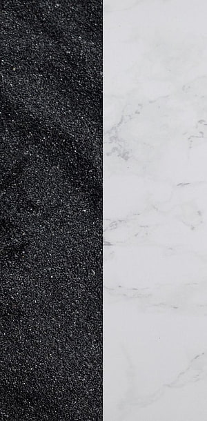 Minimalist Split Screen Texture: Black Gravel and White Marble Contrast HD phone wallpaper