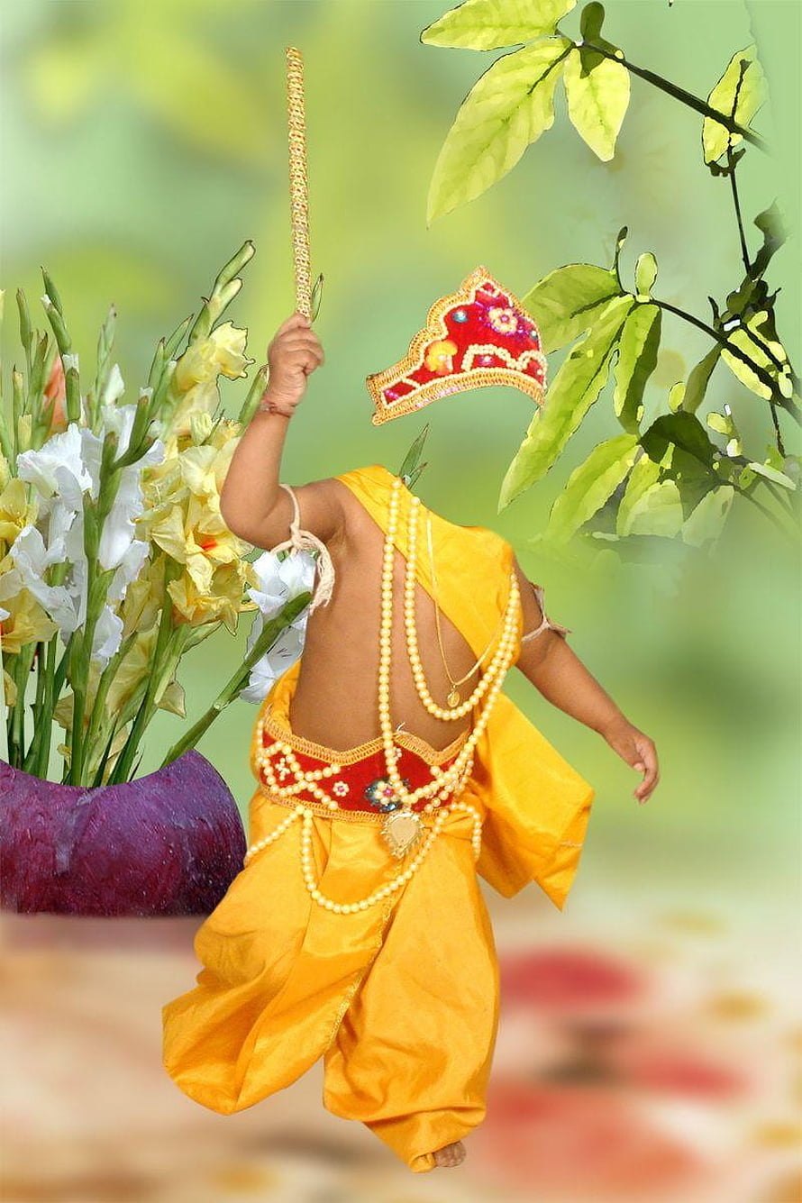 Little Krishna in Yellow Dhoti Holding Flute and Peacock Feather Crown HD phone wallpaper
