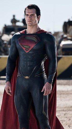 Henry Cavill as Superman in the Man of Steel armored suit with red cape HD phone wallpaper