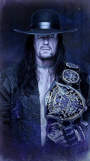 The Undertaker in Black Hat and Leather Jacket Holding Championship Belt HD phone wallpaper