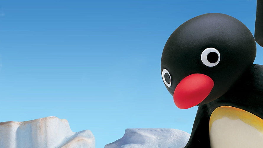 Pingu the Penguin in a Bright Arctic Landscape with Ice Floes and Clear Blue Sky HD wallpaper