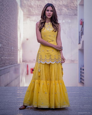 Sonam Bajwa in a Vibrant Yellow Embroidered Anarkali Suit with Intricate Gold Work HD phone wallpaper