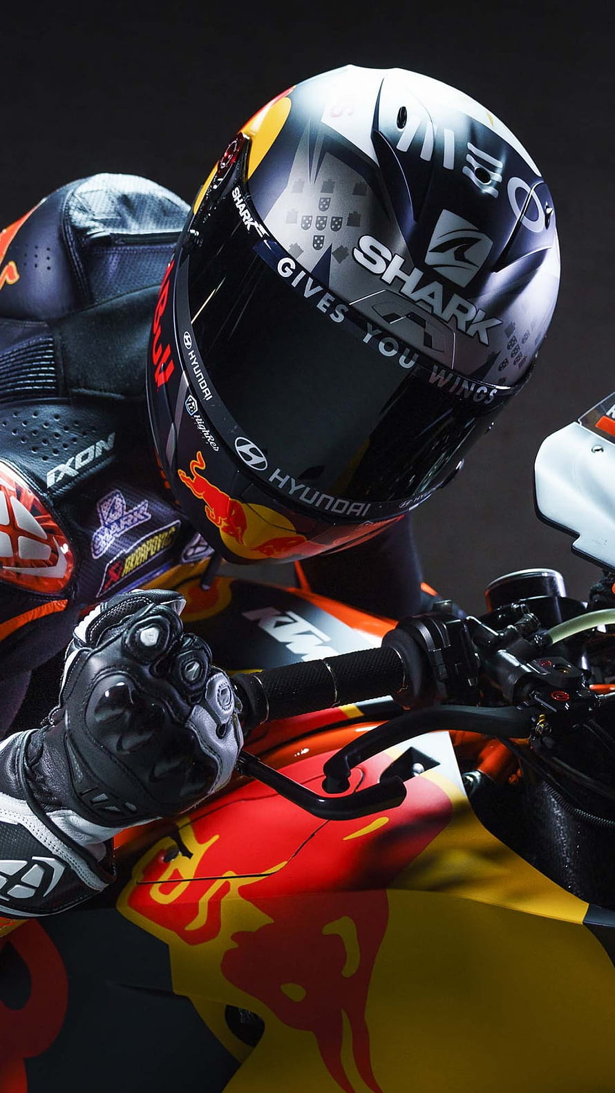 Red Bull KTM MotoGP Rider in Shark Helmet on RC16 Race Bike HD phone wallpaper