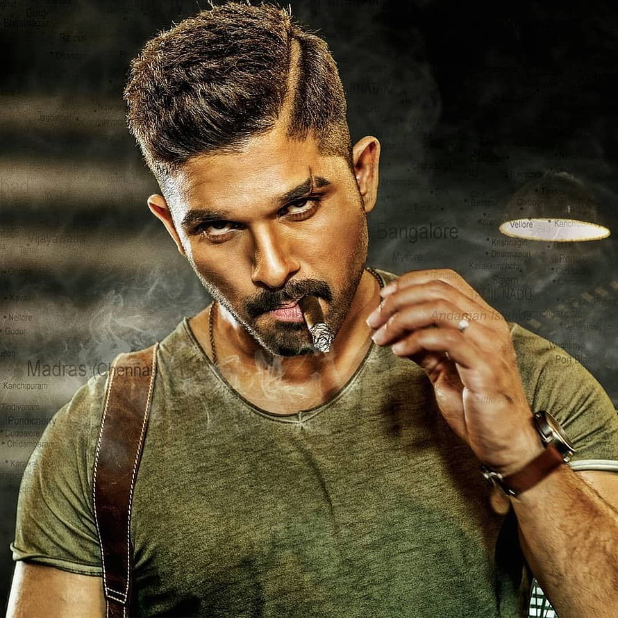 Allu Arjun as Surya in intense action pose with cigar and map background HD phone wallpaper