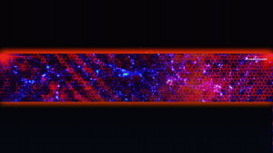 Vibrant Red and Blue Hexagonal Space Nebula Banner with Glowing Particles HD wallpaper