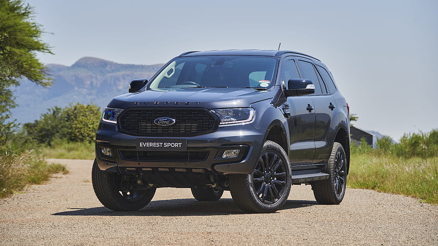 2021 Ford Everest Sport SUV Parked on Gravel Road with Mountain Backdrop HD wallpaper