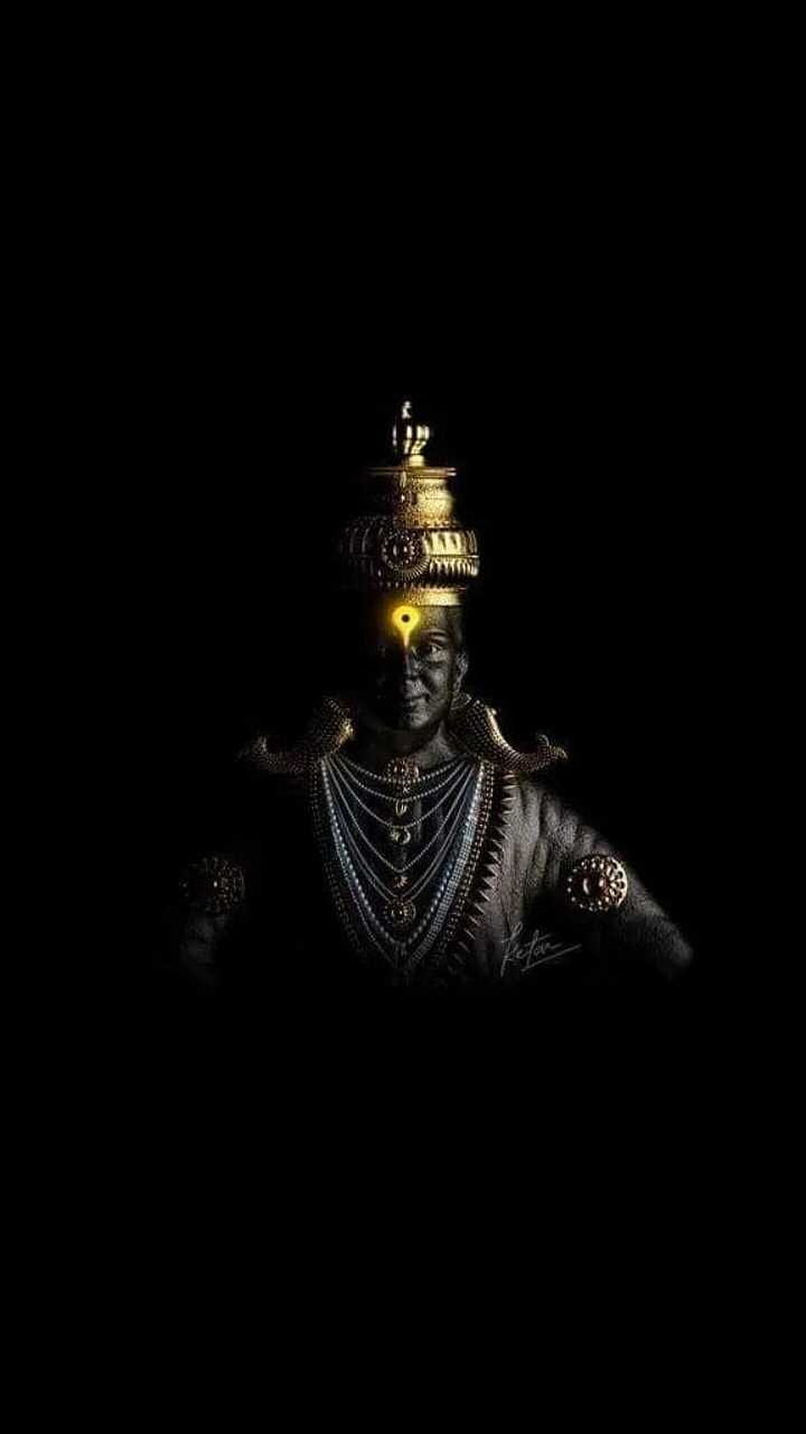 Mystical Portrait of Vitthal with Golden Crown and Glowing Third Eye on Black Background HD phone wallpaper