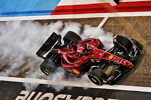 Charles Leclerc Ferrari F1 Car Drifting Through Tire Smoke on the Race Track HD wallpaper