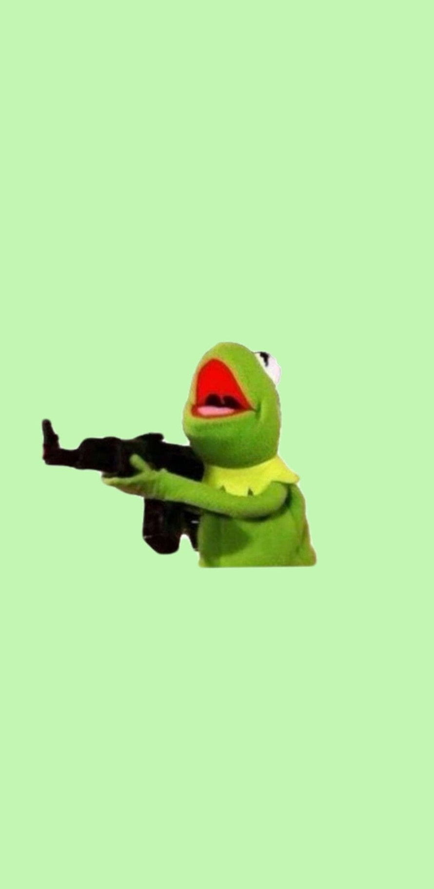 Kermit the Frog holding a rifle against a solid light green background HD phone wallpaper