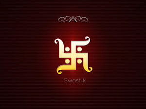 Golden Swastika Symbol on Deep Red Background with Ornamental Flourish HD wallpaper