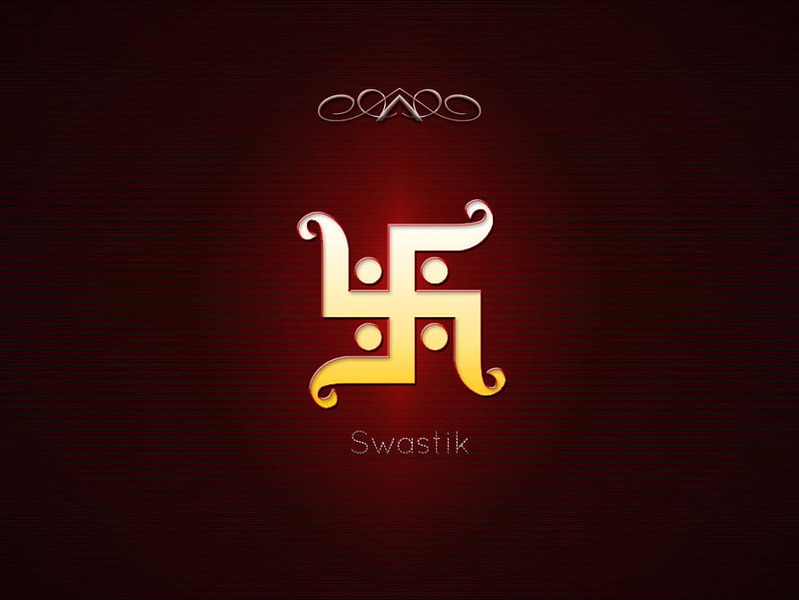 Golden Swastika Symbol on Deep Red Background with Ornamental Flourish HD wallpaper