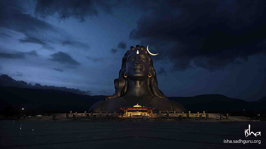 Adiyogi Shiva Statue at Isha Yoga Center Under a Dramatic Night Sky HD wallpaper