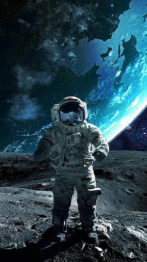 Astronaut Standing on Lunar Surface with Earth Rising in the Background HD phone wallpaper